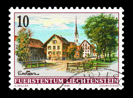 MOSCOW, RUSSIA - AUGUST 18, 2018: A stamp printed in Liechtenstein shows Eschen, Village views serie, circa 1996のeditorial素材