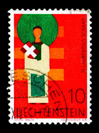 MOSCOW, RUSSIA - AUGUST 18, 2018: A stamp printed in Liechtenstein shows St. Laurentius, Schaan, serie, circa 1968のeditorial素材