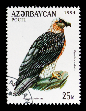 MOSCOW, RUSSIA - AUGUST 18, 2018: A stamp printed in Azerbaijan shows Bearded Vulture (Gypaetus barbatus), Birds of Prey serie, circa 1994のeditorial素材