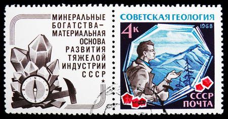 MOSCOW, RUSSIA - OCTOBER 21, 2018: A stamp printed in USSR (Russia) shows Prospector with Crystals,...
