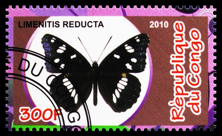 MOSCOW, RUSSIA - OCTOBER 21, 2018: A stamp printed in Congo shows Limenitis Reducta, Butterflies serie, circa 2010のeditorial素材
