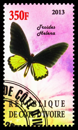MOSCOW, RUSSIA - OCTOBER 21, 2018: A stamp printed on Ivory Coast shows Iroides Helena, Butterflies serie, circa 2013のeditorial素材