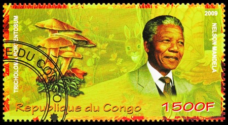 MOSCOW, RUSSIA - OCTOBER 21, 2018: A stamp printed in Congo shows Nelson Mandela and Tricholoma portentosum, Mushrooms serie, circa 2009のeditorial素材