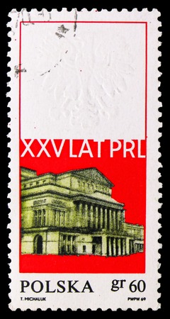 MOSCOW, RUSSIA - SEPTEMBER 15, 2018: A stamp printed in Poland shows Rebuilt Grant Theater, Warsaw, 25th Anniv. Of The Polish People's Republic serie, circa 1969のeditorial素材