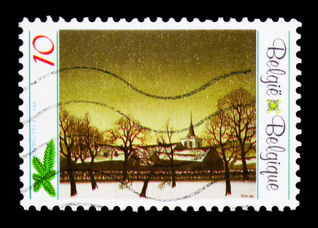 MOSCOW, RUSSIA - APRIL 15, 2018: A stamp printed in Belgium shows Painting, Christmas and New Year serie, circa 1990のeditorial素材