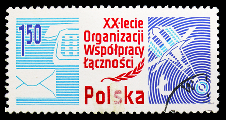 MOSCOW, RUSSIA - SEPTEMBER 15, 2018: A stamp printed in Poland shows Letter, telephone and Satellite, 20th anniversary of the Organization of Ministers of Posts and Telecommunication serie, circa 1978のeditorial素材