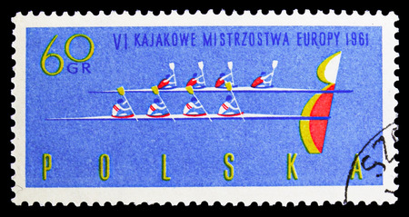 MOSCOW, RUSSIA - SEPTEMBER 15, 2018: A stamp printed in Poland shows Four-man canoes at finish line and "B", 6th European Canoe Championships serie, circa 1961のeditorial素材