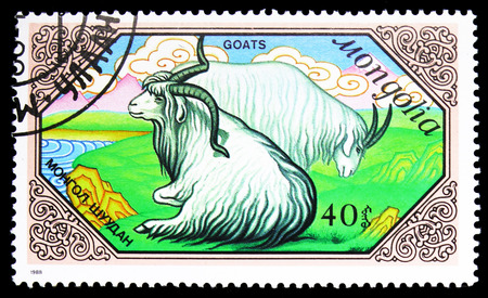 MOSCOW, RUSSIA - SEPTEMBER 26, 2018: A stamp printed in Mongolia shows Goat (Capra aegagrus hircus), Goats serie, circa 1988のeditorial素材
