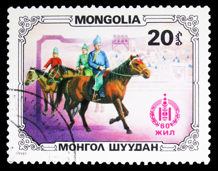 MOSCOW, RUSSIA - SEPTEMBER 26, 2018: A stamp printed in Mongolia shows Horsemen, Sport and culture serie, circa 1981のeditorial素材