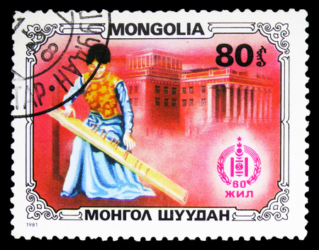 MOSCOW, RUSSIA - SEPTEMBER 26, 2018: A stamp printed in Mongolia shows Girl playing jatga, Sport and culture serie, circa 1981のeditorial素材