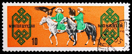 MOSCOW, RUSSIA - NOVEMBER 26, 2018: A stamp printed in Mongolia shows Hunting With Falcons, Horse...