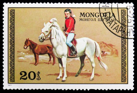 MOSCOW, RUSSIA - NOVEMBER 26, 2018: A stamp printed in Mongolia shows Girl on horseback, Horses serie, circa 1977のeditorial素材
