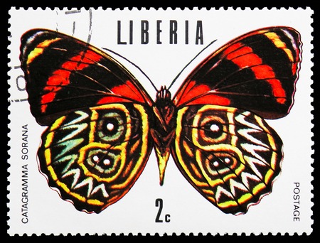 MOSCOW, RUSSIA - NOVEMBER 10, 2018: A stamp printed in Liberia shows Sorana Eighty-eight (Catagramma sorana), Tropical butterflies serie, circa 1974のeditorial素材