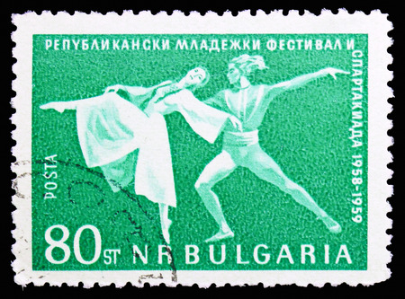 MOSCOW, RUSSIA - NOVEMBER 10, 2018: A stamp printed in Bulgaria shows Ballet Scene from "Dragon and Jana", â­7th International Youth Festival, Vienna serie, circa 1959のeditorial素材