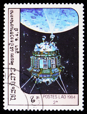 MOSCOW, RUSSIA - FEBRUARY 9, 2019: A stamp printed in Laos shows Space exploration Luna 3, serie, circa 1984のeditorial素材