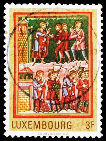 MOSCOW, RUSSIA - FEBRUARY 10, 2019: A stamp printed in Luxembourg shows Medieval Miniatures, serie, circa 1971のeditorial素材