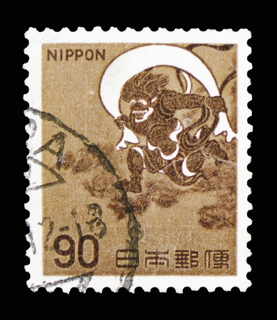 MOSCOW, RUSSIA - FEBRUARY 10, 2019: A stamp printed in Japan shows Wind God of Sotatsu Yawaraya (1596-1634), Fauna, Flora and Cultural Heritage serie, circa 1966のeditorial素材