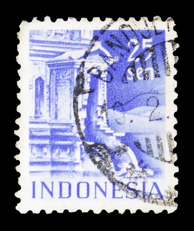 MOSCOW, RUSSIA - FEBRUARY 10, 2019: A stamp printed in Indonesia shows Entrance to Tjandi-Poentadewa Temple, Buildings serie, circa 1949のeditorial素材