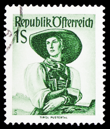 MOSCOW, RUSSIA - FEBRUARY 10, 2019: A stamp printed in Austria shows Tyrol, Pustertal, Provincial Costumes 1948/58 serie, circa 1951のeditorial素材