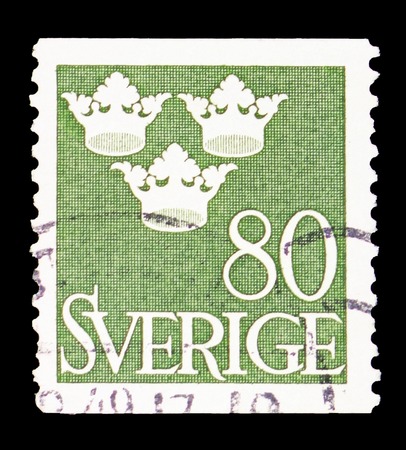 MOSCOW, RUSSIA - FEBRUARY 10, 2019: A stamp printed in Sweden shows Three Crowns, serie, circa 1948のeditorial素材