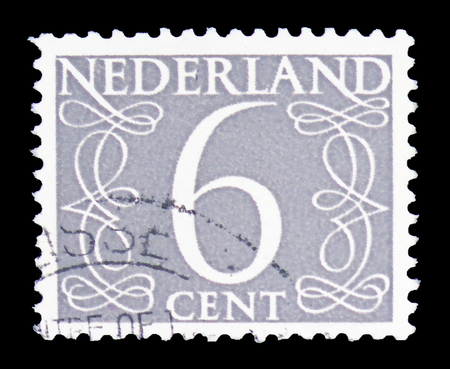 MOSCOW, RUSSIA - FEBRUARY 10, 2019: A stamp printed in Netherlands shows Numeral, Numbers serie, circa 1954のeditorial素材