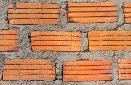 Wall made of red bricks suitable for backgroundの写真素材