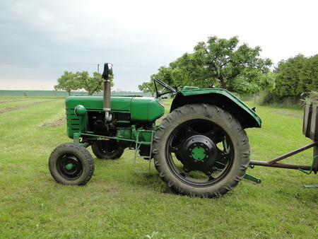 An old green tractorの写真素材