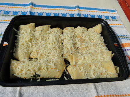 Crepe with spinach and cheese before bakingの写真素材