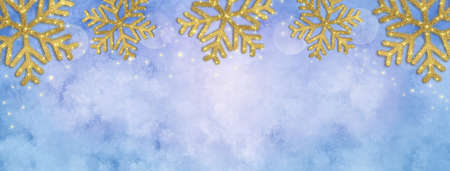 Golden Christmas Snowflakes On Watercolor Painted Snow Backgroundの写真素材