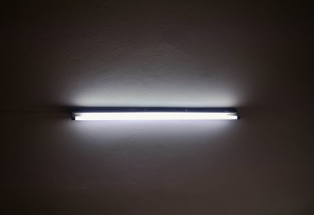 The lamp is turned on on the ceiling.の写真素材