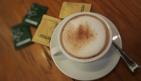 A glass of hot cocoa in the cafe.の写真素材
