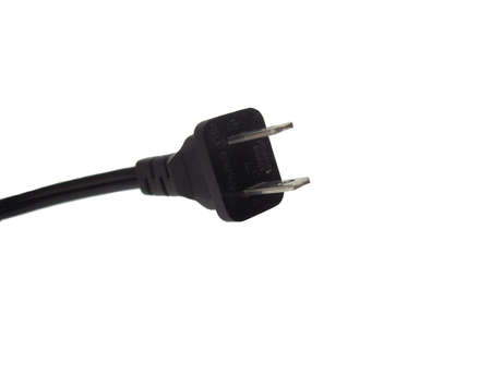 Isolated black electrical plug on white backgroundの写真素材