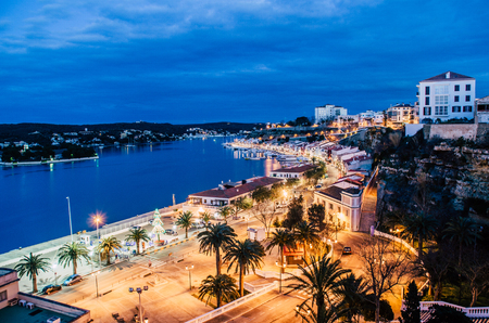 Photograph of a night landscape of the port of Maó, Menorca. One of the largest natural harbors in the world.の写真素材