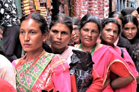 NEPAL BHAKTAPUR WOMEN LINED UP TO RECEIVE THE BLESSING DURIN THE TEEJ FESTIVALのeditorial素材