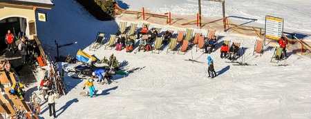 Semmering, Austria in winter. People skiing on snow covered slope in austrian Alps. Mountains ski resort - nature and sport background. Web bannerのeditorial素材