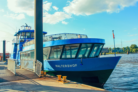 river public transport ferries and passenger river buses on routes on the Elbe River Hamburg Germany June 2010のeditorial素材
