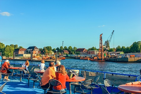 river public transport ferries and passenger river buses on routes on the Elbe River Hamburg Germany June 2010のeditorial素材