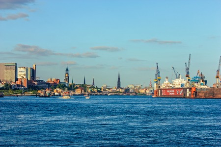 Shipyard and harbor shipbuilding with crane machine and container ship in Hamburg Germany, june 2010のeditorial素材