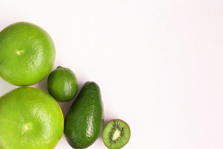 Creative background of green various summer tropical fruits.の写真素材