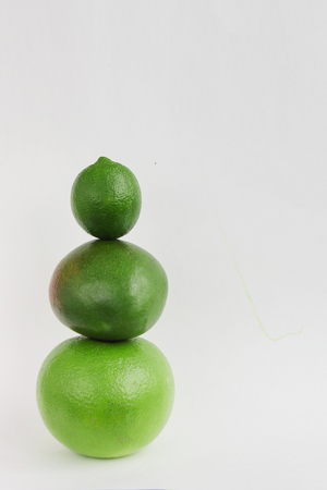 Creative background of green various summer tropical fruits.の写真素材