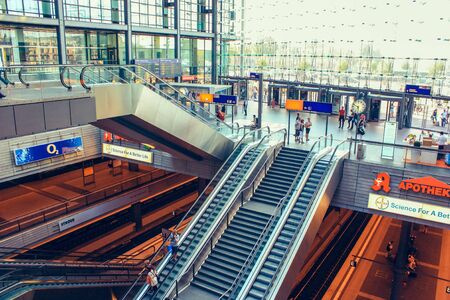 Berlin june 2010. People in central main railway train station in Berlin, Germany. The historic Lehrter Bahnhof is opened in 2006.のeditorial素材