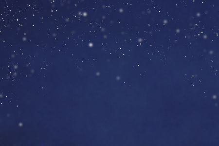 Christmas decoration blue velvet background with snowflakes Card concept. Closeup. Top view. Flat lay. Copy spaceの写真素材