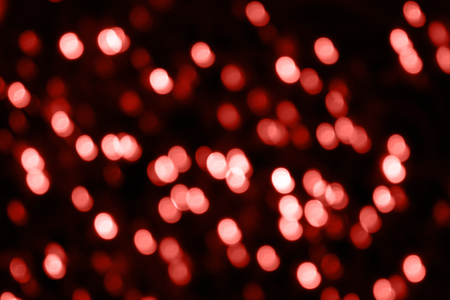 Trend concept color of the year 2019 Living Coral. Vivid abstract bright spots blackground. Bokeh. Soft focus. Round shapes.の写真素材