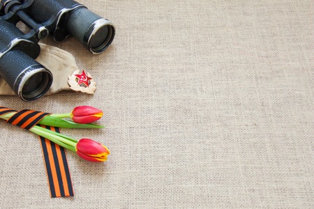 Symbols of memory and respect of the victory of Soviet soldiers in the Second World War and the Russian military in armed conflicts. 9 May, 23 February card concept. Copy space for text, front viewの写真素材
