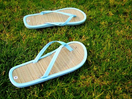 thongs on the grassの写真素材
