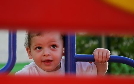boy enjoys the playgroundの写真素材
