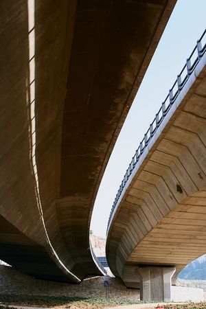 A photo of the under side of a bridgeの写真素材