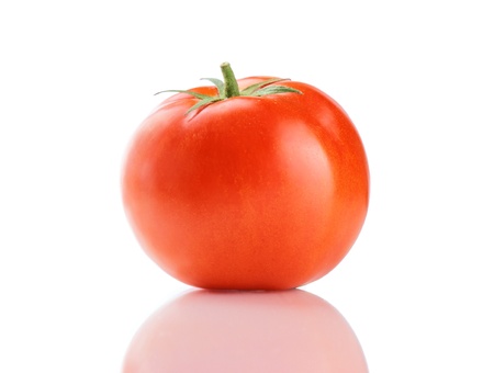 A Fresh ripe red truss tomato isolated on white.の写真素材