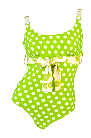 Coloured fused swimsuit. light green polka dots swimsuit isolated on white backgroundの写真素材