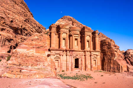 Petra, stunning view from a cave of the Ad Deir - Monastery in the ancient city, travel background...